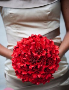 Wedding Ideas : DIY Wedding Bouquet With Origami Paper! It looks like they used some red riboon or strips of red paper between the flowers